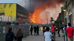 Crews tackle fire engulfing waste centre