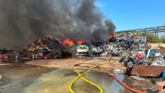 Crews leave scrap metal fire site after two days