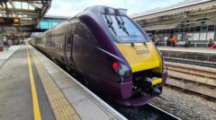 Train delayed 'due to people trying to hang flags'