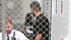 Man accused of rape 'posed for the boys' - court