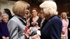 In pictures: Fashion royalty meets British royalty