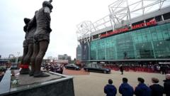 Fans bid farewell to Denis Law at United star's funeral