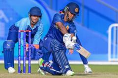 Sri Lanka's Chamari Athapaththu (R) plays a shot during the 2022 Asian Games women's final cricket match between Sri Lanka and India in Hangzhou in China's eastern Zhejiang province on September 25, 2023
