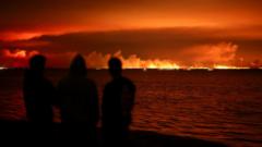France orders evacuation of peninsula as hundreds flee wildfires by boat