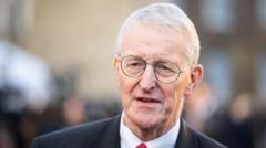 NI secretary deeply concerned by review into legacy body