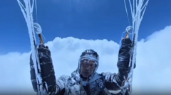 Chinese paraglider pulled 8,000m high into clouds