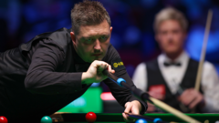 Wilson fights back to beat Robertson and reach final