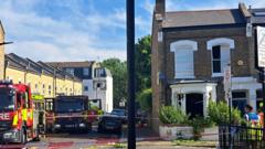 Murder arrest as woman found stabbed in house after 'gas explosion'