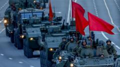 Russian military vehicles move along Tverskaya street during the rehearsal of Victory Day military parade marking the 77th anniversary of the victory over Nazi Germany in World War I