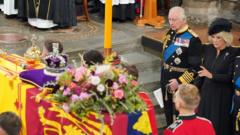 King Charles watches the funeral service