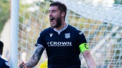 Dramatic equaliser takes Dundee a point clear