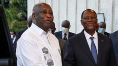 Pirezidaant Alassane Ouattara fi Laurent Gbagbo masaraa biyyaalessaatti harka walqabuun waldubbisan.