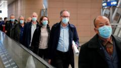 Members of the WHO team arrive in Shanghai (10 Feb)