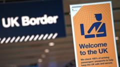 UK border signage is pictured at the passport control in Arrivals in Terminal 2 at Heathrow Airport in London on July 16, 2019