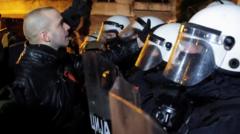 Police blocked far-right leader Damjan Knezevic as he and other protesters tried to storm the presidency