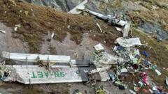 The wreckage of a Twin Otter aircraft, operated by Nepali carrier Tara Air, lay on a mountainside in Mustang on May 30, 2022, a day after it crashed.