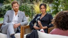 Prince Harry and Meghan being interviewed by Oprah