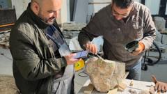 Experts examine artefacts