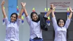 Students of Government Girls Higher Secondary School in Kerala's Balussery town in their new uniform