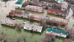 Record floods threaten Russian city as waters rise