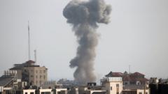 Smoke rises following an Israeli air strike, amid Israeli-Palestinian fighting, in Gaza, May 20, 2021.