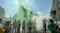 Watch Celtic fans celebrate following title win