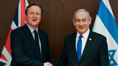 Lord Cameron shaking hands with Benjamin Netanyahu