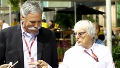 Chase Carey and Bernie Ecclestone