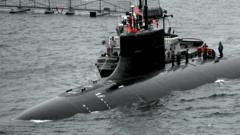 The Seawolf-class attack submarine USS Connecticut returns to port at Naval Base Kitsap-Bremerton on 27 April 2011