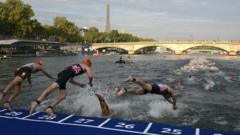 Rain at Paris 2024 will make Seine events 'difficult'