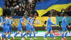 україна