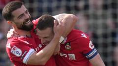 Wrexham hit Rovers for six to seal promotion