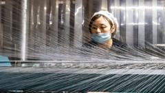 A woman working in a textile factory in Nantong in China's eastern Jiangsu province