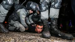 예루살렘에서 경찰에 붙잡힌 시위대