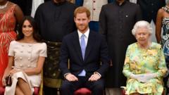 Meghan Markle, el príncipe Harry y la reina Isabel II