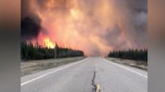 Plumes of wildfire smoke block Canadian motorway