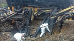 Forensic personnel working at the explosion site in Poland
