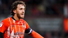 Luton's Lockyer to return home after collapse