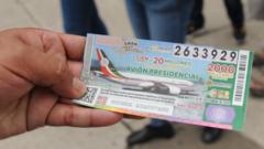 A person who has bought a ticket in Mexico's plane lottery holds up his ticket