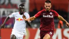 Salzburg's Marin Pongracic and Leipzig's Jean-Kevin Augustin