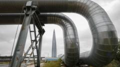 Gazprom's St Petersburg HQ seen behind pipeline