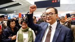 Sam Rainsy at Paris airport