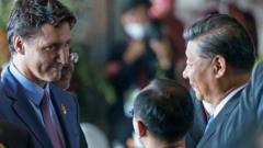 特魯多（中左）與習近平（中右）在印尼巴厘G20峰會會場外交談（加拿大總理府照片15/11/2022）