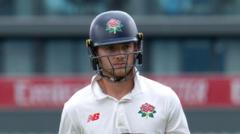 Hurst digs in for Lancashire with Durham on top