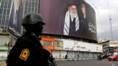 Iran taking steps to prevent anti-establishment protests, Tehran residents tell BBC