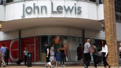 John Lewis says recovery on track as losses narrow