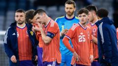 'Scotland's Hampden warriors return to reserved selves'