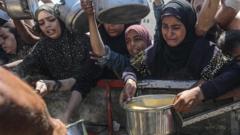 End Israel's weaponisation of Gaza aid, 100 groups say