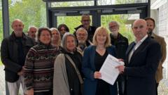 Uni presses on with 2,000-home plan after backlash