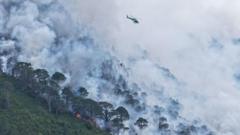 Helicopter waterbombs Cairngorms wildfire as it burns for a third day 